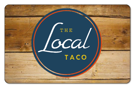 the local taco logo on a background of wood boards